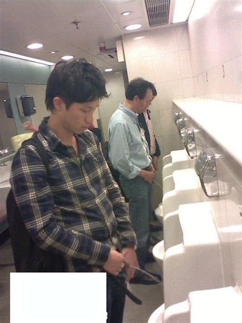 At the urinal, there was a man next to me. He was tall and homely, and holding himself. He stared at me. I was electrified, but held to that spot; he shook himself at me and I couldn’t move. We ...